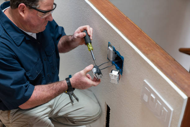electrician-installing-light-swi.png